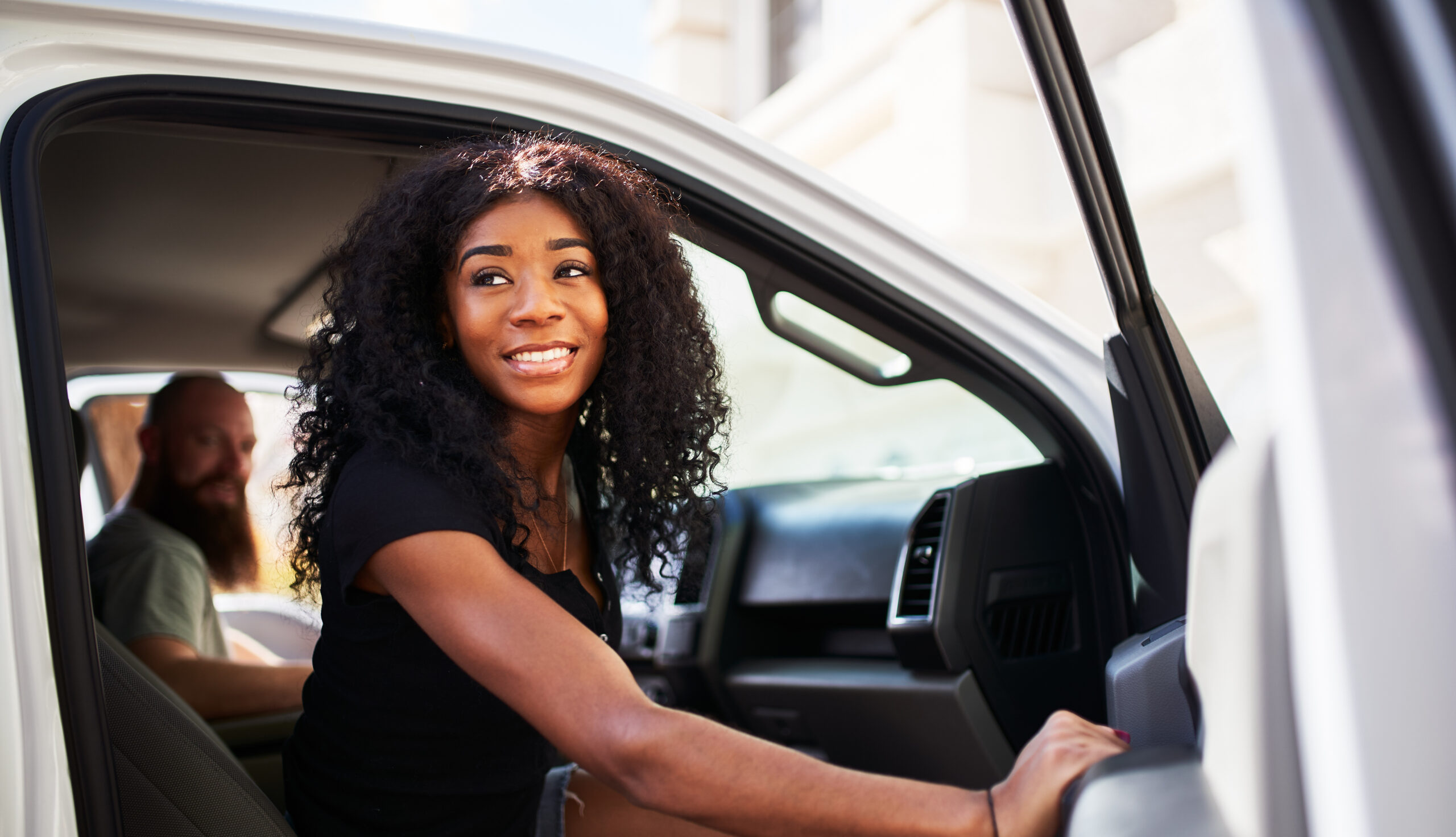 Medical Transportation - lady getting out of ride share car